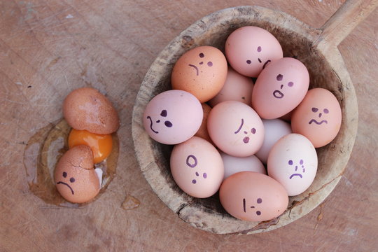 Eggs and wooden background