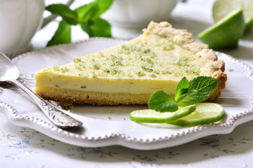 Lime cheesecake with mint sugar.