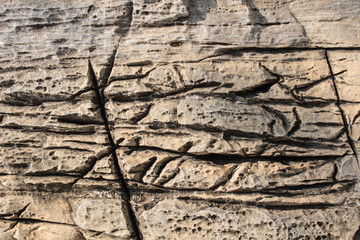 The sharp crack of a rock mountain.