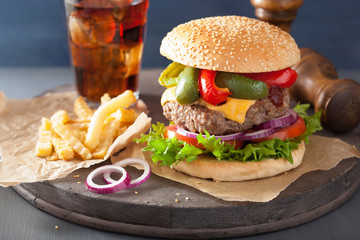 homedade cheese burger with peppers tomato onion