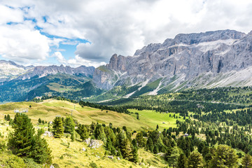 Naklejka na ściany i meble Hiking and trekking in the beautiful Mountains of Dolomites, Italy