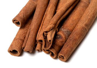 Cinnamon sticks on white