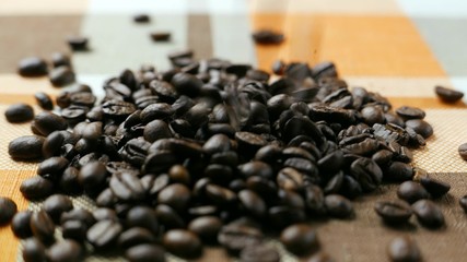 Roasted coffee beans poured in a heap