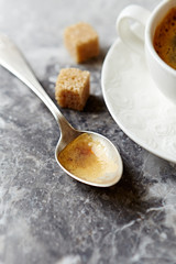 Remains of coffee on a spoon
