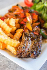 Grilled pork ribs steak and vegetables