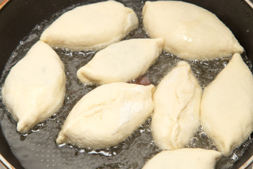 Fototapeta na wymiar Food patties in a frying pan