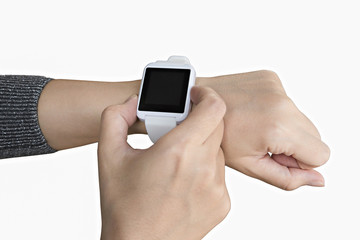 Female touching her smartwatch