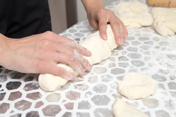 cooking cakes of the dough in the kitchen