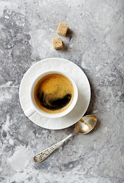 Cup of coffee on a stone background
