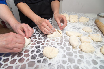 cooking cakes of the dough in the kitchen