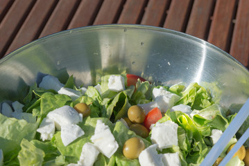 Aerial view closeup of homemade spicy guacamole dip served in bowl