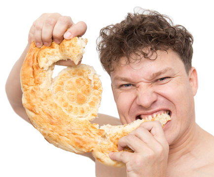 Man Eats Bread On A White Background