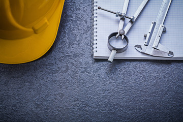 Naklejka premium Copybook hard hat divider vernier scale construction concept