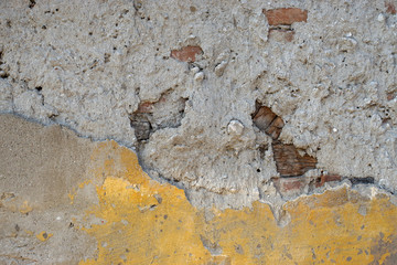 Part of the old wall crumbling abandoned building.