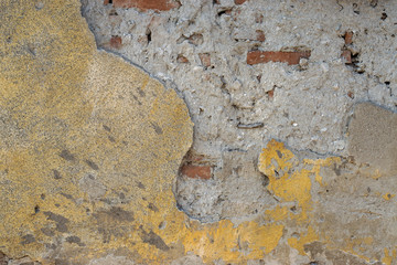 Part of the old wall crumbling abandoned building.