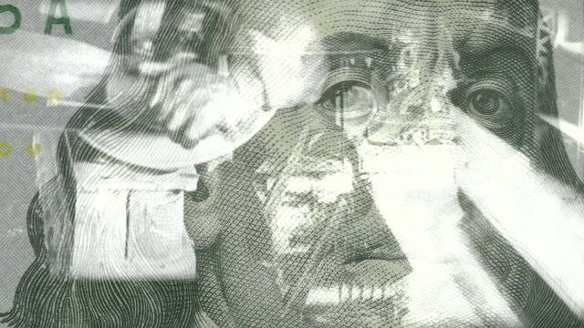 4K montage of manufacturing clips spanning the 20th century, including old public domain clips, superimposed over a $100 bill US currency. Themes of money, success and business.