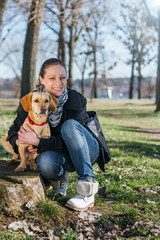 Woman with a dog in the park