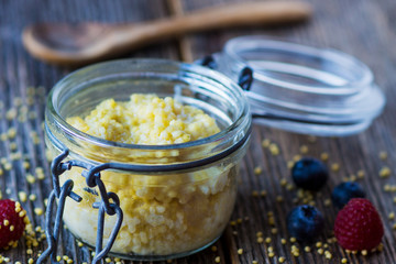 Millet porridge with milk and berries