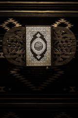 Koran - holy book of Muslims,vintage style filtered photo