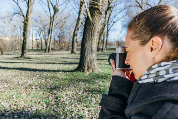 Woman taking photos in the park