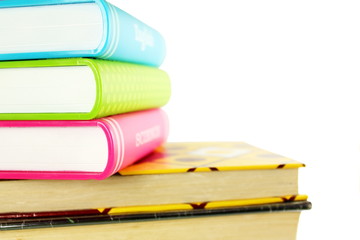 Stack of books isolated closeup on white background