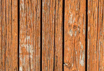 Fototapeta premium Background texture of wooden planks painted in brown color.