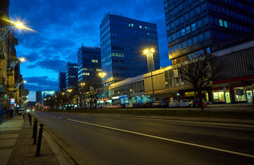 Skyscrapers Street at night in the city center in Poznan.