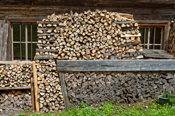 Rural scene firewood stacked in a mountain hut