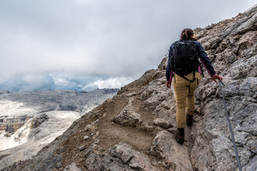 Hiker in Dolomites of Italy