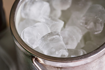 Bucket with ice cubes