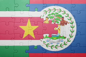 puzzle with the national flag of belize and suriname
