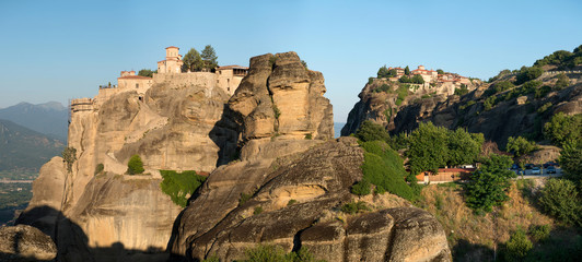 The Holy Monastery of Varlaam and Holy Monastery of Great Meteoron in Meteora - complex of Eastern Orthodox monasteries at sunrise, Greece