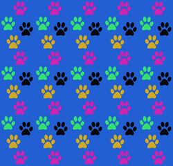 Background seamless fun print of the paws of the animal. Factory color paw dog on a blue background. The imprint of paws of a pet. Print on a blue background. 