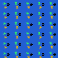 Obraz na płótnie Canvas Seamless fun print of the paws of the animal. Factory color paw dog on a blue background. The imprint of paws of a pet. Print on a blue background. 