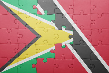 puzzle with the national flag of trinidad and tobago and guyana