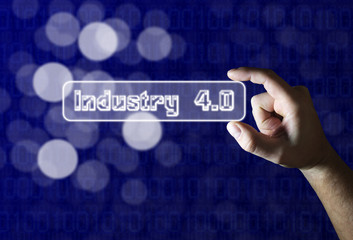 Hand holding industry 4.0 sign on blue background