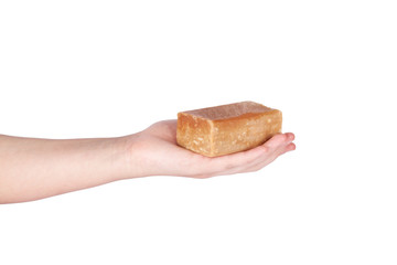 Beautiful and elegant human female hand with laundry soap