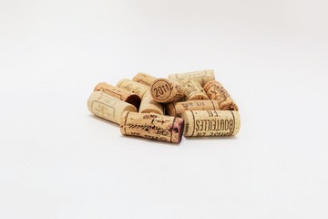 Several corks from French vineyards isolated on a white background