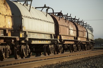 Fototapeta na wymiar freight train with cars on rail