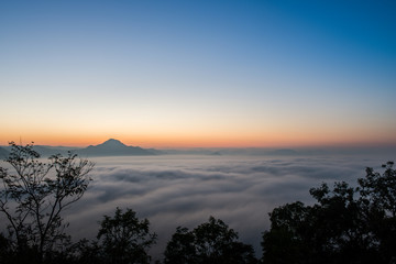 sunlight and fog at phu thok