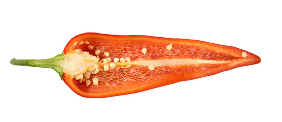 Cut red peppers on a white background