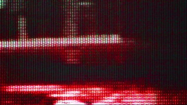 TV Noise 0305: Stock footage of noisy TV images flickering (Video Loop).