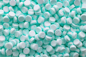 Many medication tablets and pills