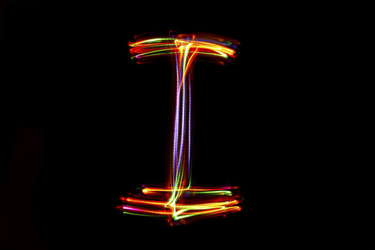 Word writing from light on the black background.