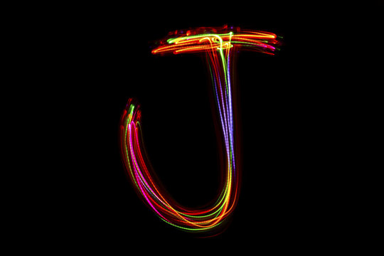 Word writing from light on the black background.