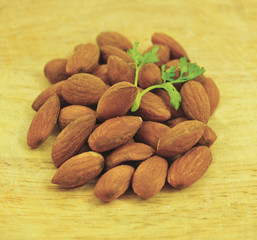 Heap of almond nuts isolated 