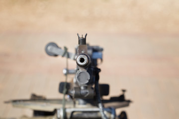 Automatic machine gun directed toward.