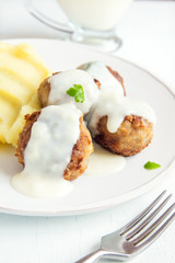 Meatballs with white creamy sauce