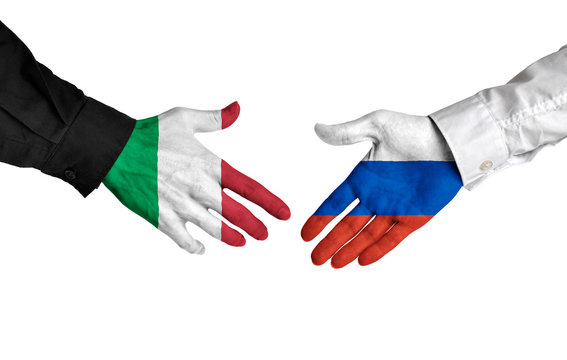 Italy and Russia leaders shaking hands on a deal agreement