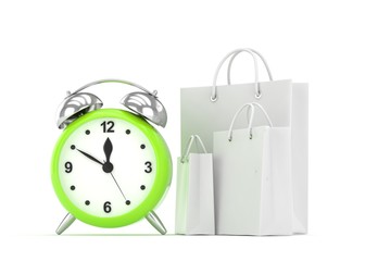 alarm clock and shopping bag (time to buy concept)